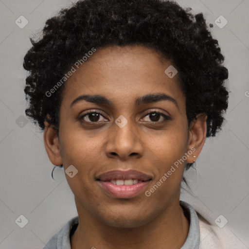 Joyful black young-adult female with short  black hair and brown eyes