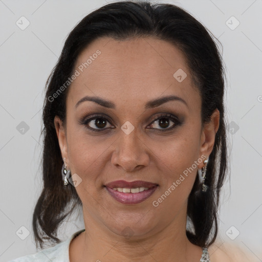 Joyful latino young-adult female with medium  brown hair and brown eyes