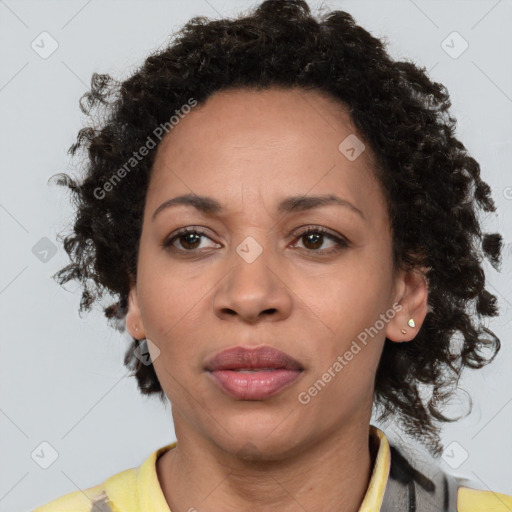 Neutral black adult female with short  brown hair and brown eyes