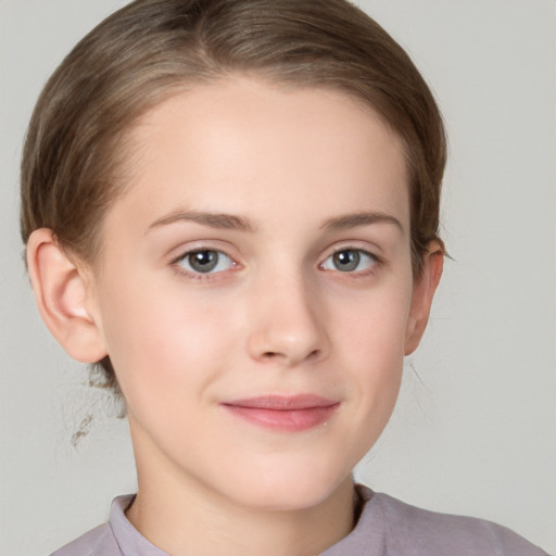 Joyful white child female with medium  brown hair and brown eyes