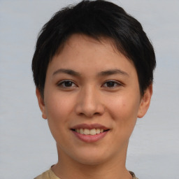 Joyful asian young-adult female with short  brown hair and brown eyes