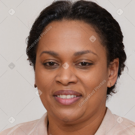 Joyful latino adult female with short  brown hair and brown eyes