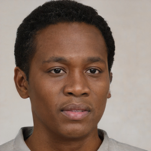 Neutral black young-adult male with short  brown hair and brown eyes