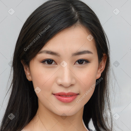 Joyful asian young-adult female with long  brown hair and brown eyes