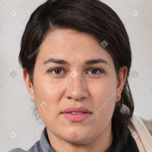 Joyful white adult female with medium  brown hair and brown eyes