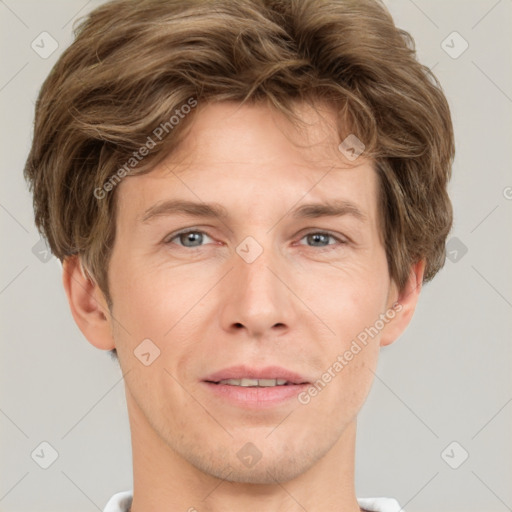 Joyful white adult male with short  brown hair and grey eyes