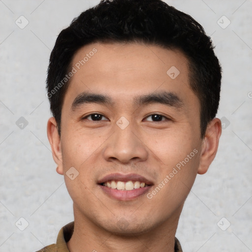 Joyful latino young-adult male with short  black hair and brown eyes