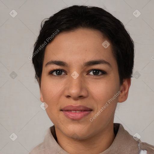 Joyful asian young-adult female with short  black hair and brown eyes