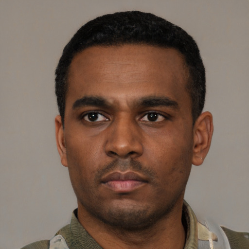Neutral latino young-adult male with short  black hair and brown eyes