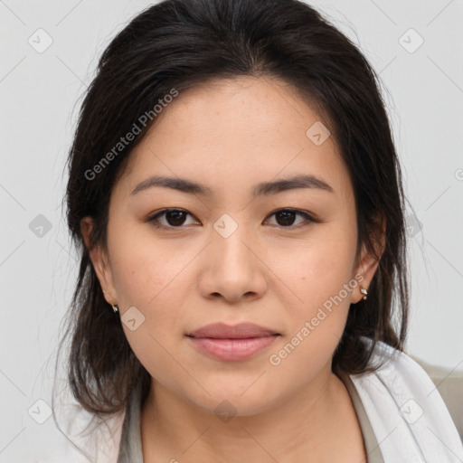 Joyful asian young-adult female with medium  brown hair and brown eyes