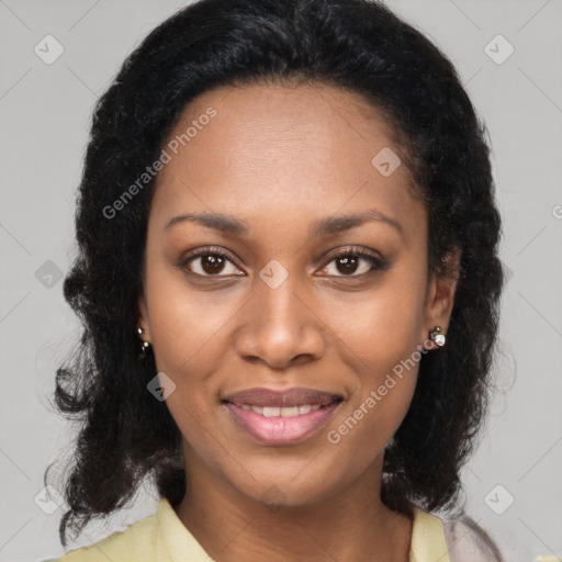 Joyful black young-adult female with medium  brown hair and brown eyes