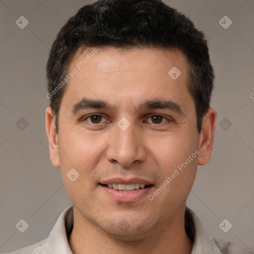 Joyful white young-adult male with short  brown hair and brown eyes