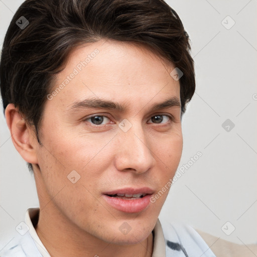 Neutral white young-adult male with short  brown hair and brown eyes