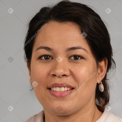 Joyful white adult female with medium  brown hair and brown eyes