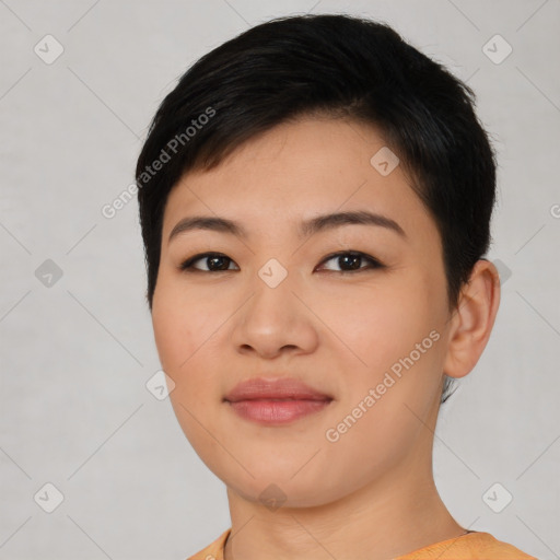 Joyful asian young-adult female with short  black hair and brown eyes