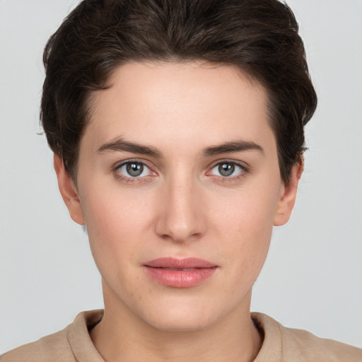 Neutral white young-adult female with short  brown hair and brown eyes