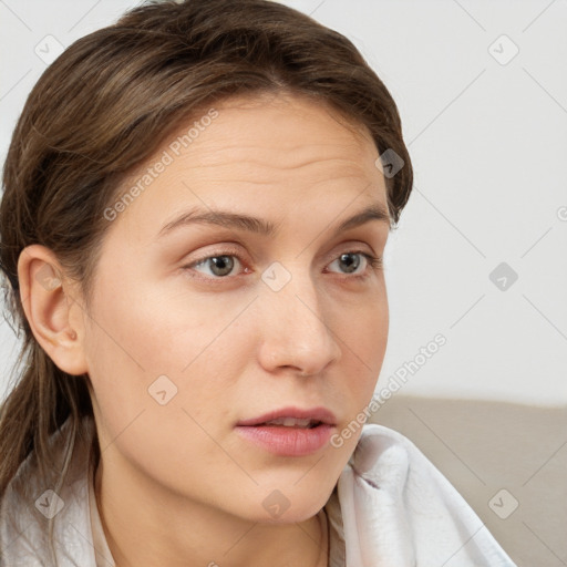 Neutral white young-adult female with medium  brown hair and grey eyes