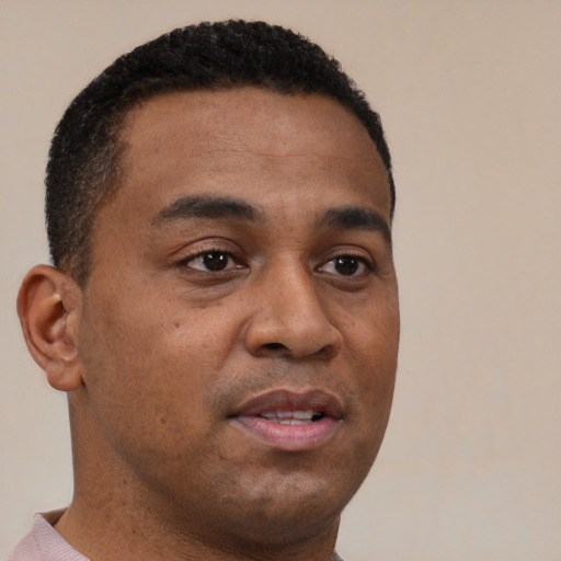 Neutral black young-adult male with short  brown hair and brown eyes