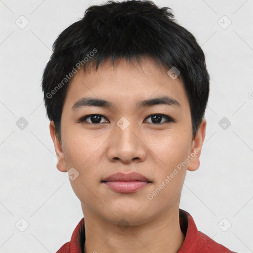 Joyful asian young-adult male with short  black hair and brown eyes