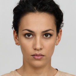 Neutral latino young-adult female with short  brown hair and brown eyes