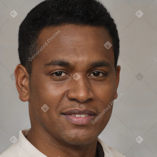Joyful latino young-adult male with short  brown hair and brown eyes