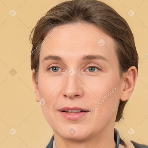 Joyful white adult female with short  brown hair and brown eyes