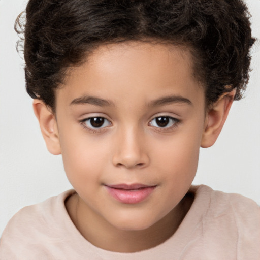 Joyful white child female with short  brown hair and brown eyes