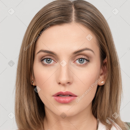 Neutral white young-adult female with long  brown hair and green eyes