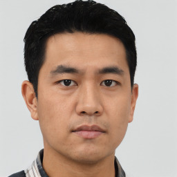 Neutral asian young-adult male with short  black hair and brown eyes