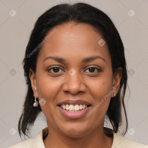 Joyful latino young-adult female with medium  brown hair and brown eyes