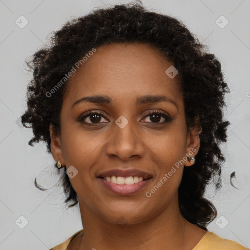 Joyful black young-adult female with medium  brown hair and brown eyes