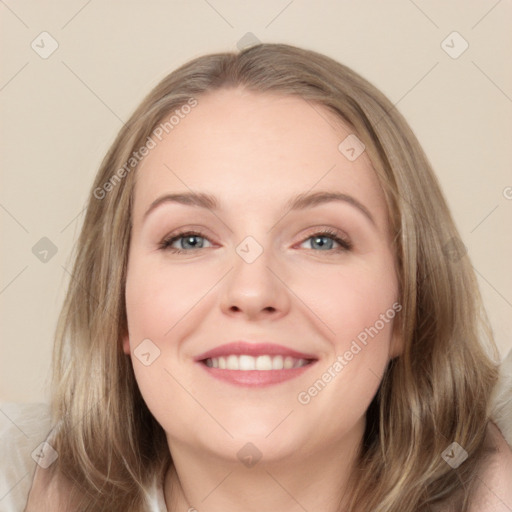 Joyful white young-adult female with medium  brown hair and blue eyes