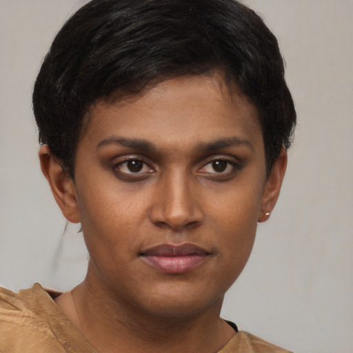 Neutral black young-adult female with short  brown hair and brown eyes