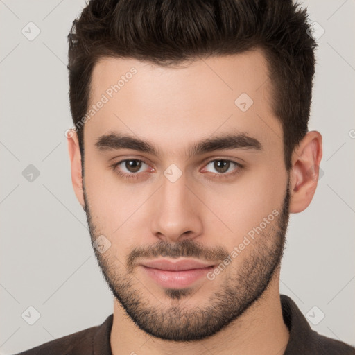 Neutral white young-adult male with short  brown hair and brown eyes