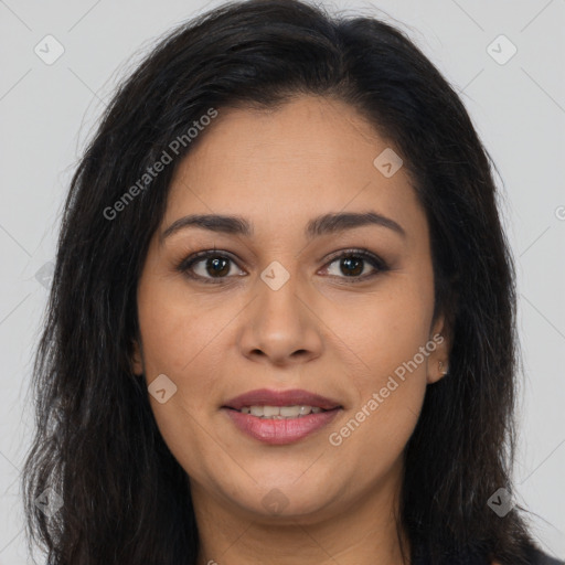 Joyful latino young-adult female with long  brown hair and brown eyes