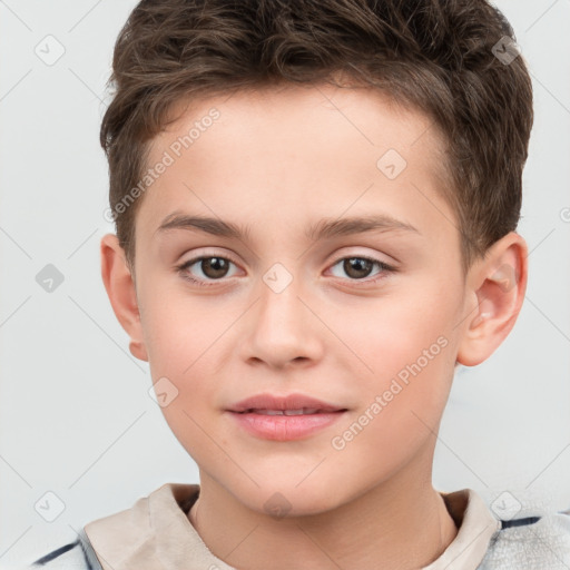 Joyful white child male with short  brown hair and brown eyes