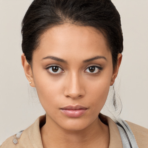 Neutral white young-adult female with short  brown hair and brown eyes