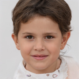 Joyful white child male with short  brown hair and brown eyes