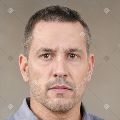 Neutral white adult male with short  brown hair and brown eyes