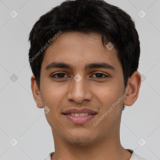 Joyful latino young-adult male with short  brown hair and brown eyes