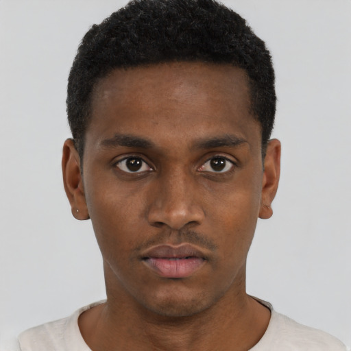 Neutral black young-adult male with short  brown hair and brown eyes