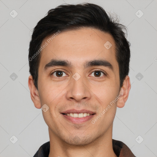 Joyful white young-adult male with short  black hair and brown eyes