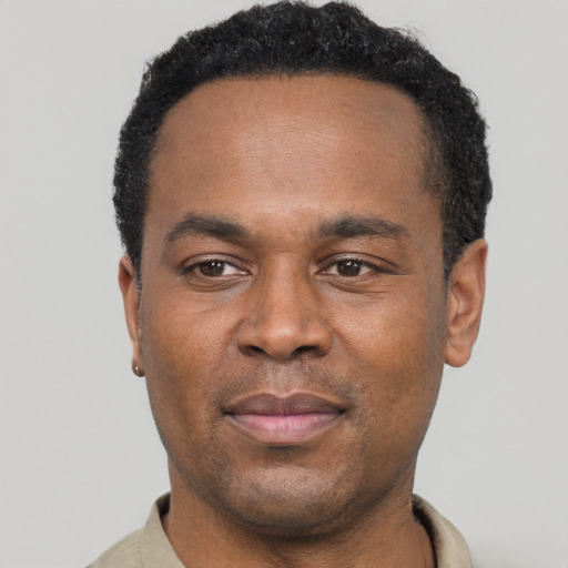 Neutral latino adult male with short  black hair and brown eyes