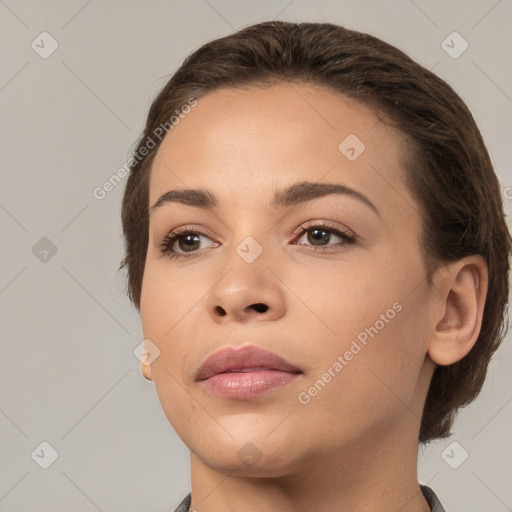 Neutral white young-adult female with medium  brown hair and brown eyes