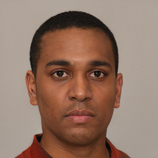 Neutral latino young-adult male with short  brown hair and brown eyes