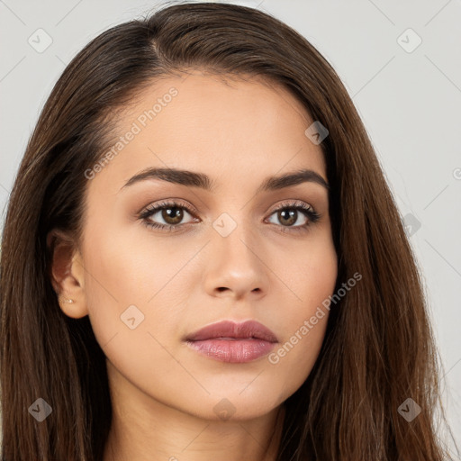 Neutral white young-adult female with long  brown hair and brown eyes