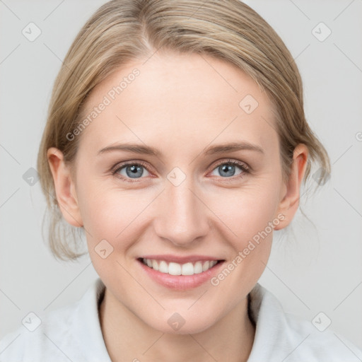 Joyful white young-adult female with medium  brown hair and blue eyes