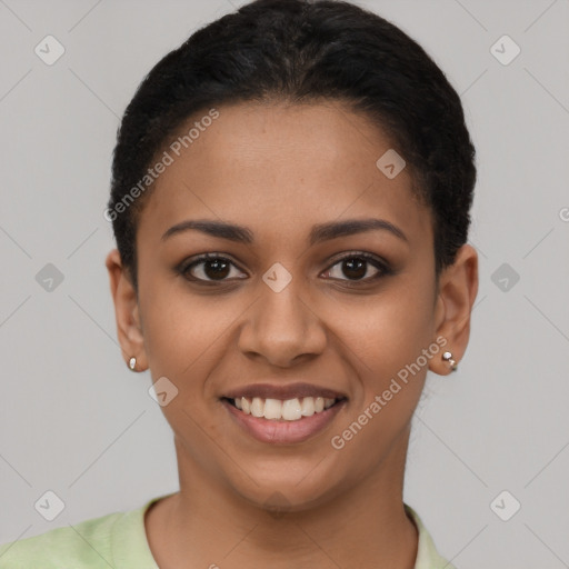 Joyful latino young-adult female with short  brown hair and brown eyes