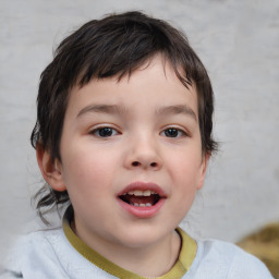 Joyful white child male with short  brown hair and brown eyes