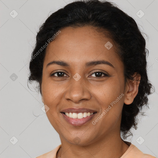 Joyful latino young-adult female with long  brown hair and brown eyes